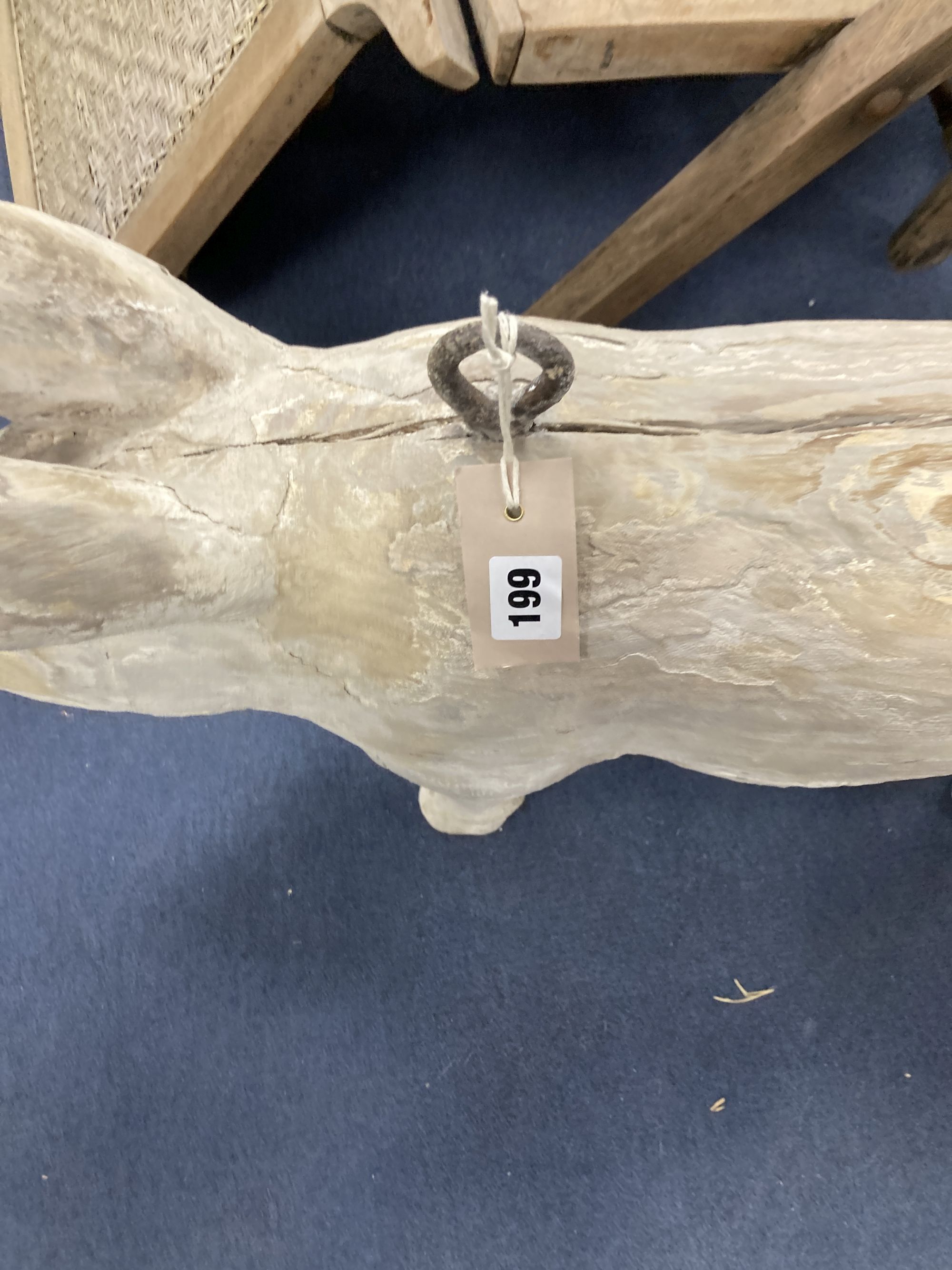 A carved wood butchers shop model of a pig, length 76cm